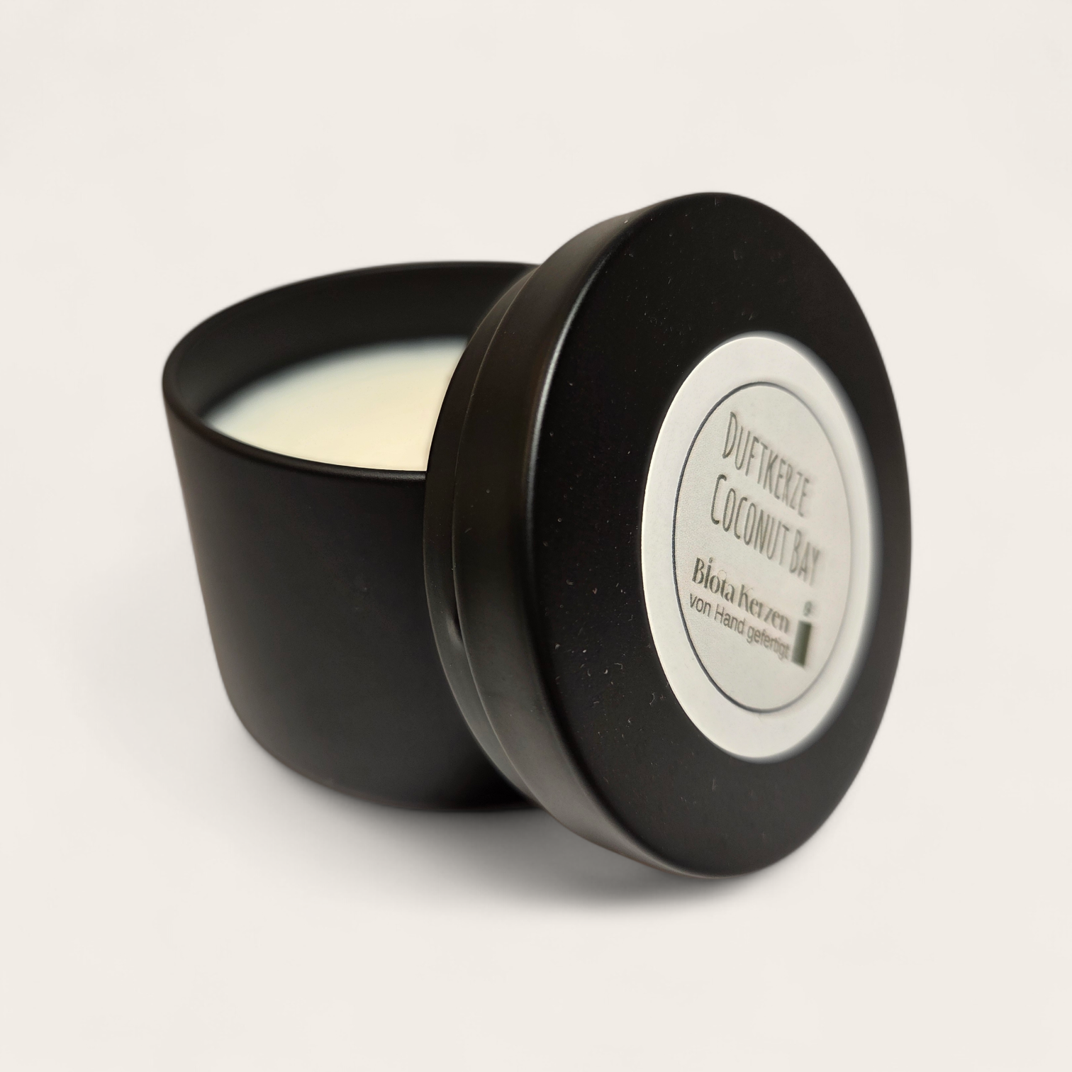 Duftkerze Coconut Bay im schwarzen Metallbehälter
